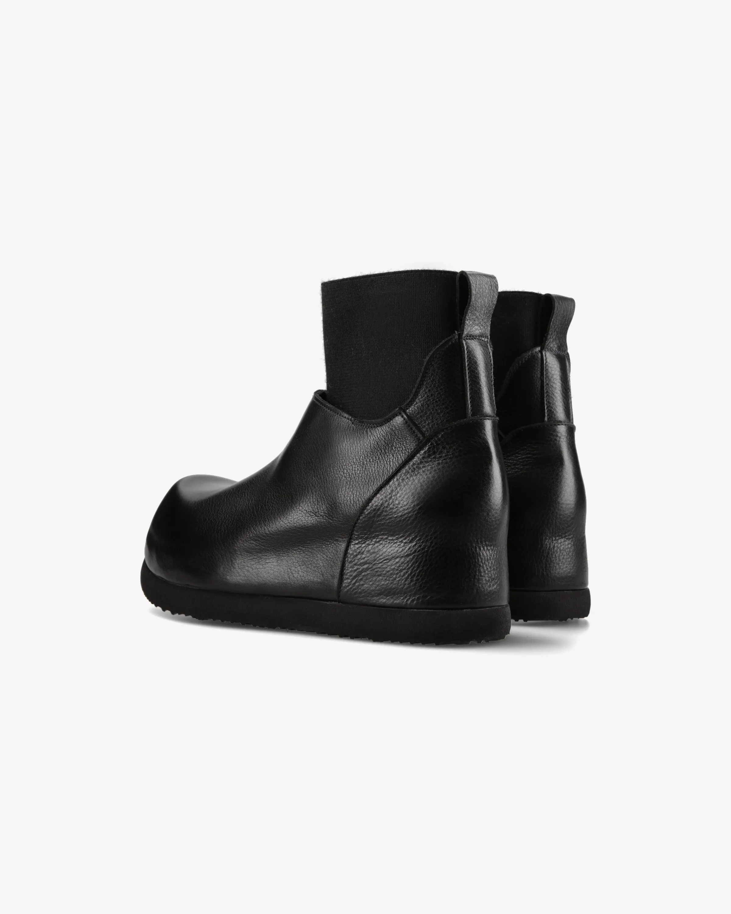 Ankle boots in black calfskin and nodik wool