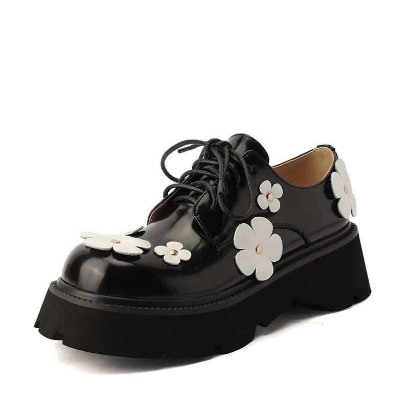 Thick Bottom Black Leather Loafers with White Leather Daisy Appliqués