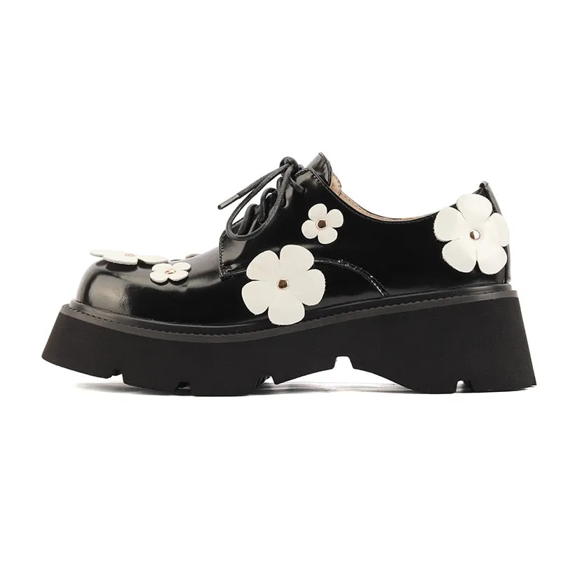 Thick Bottom Black Leather Loafers with White Leather Daisy Appliqués