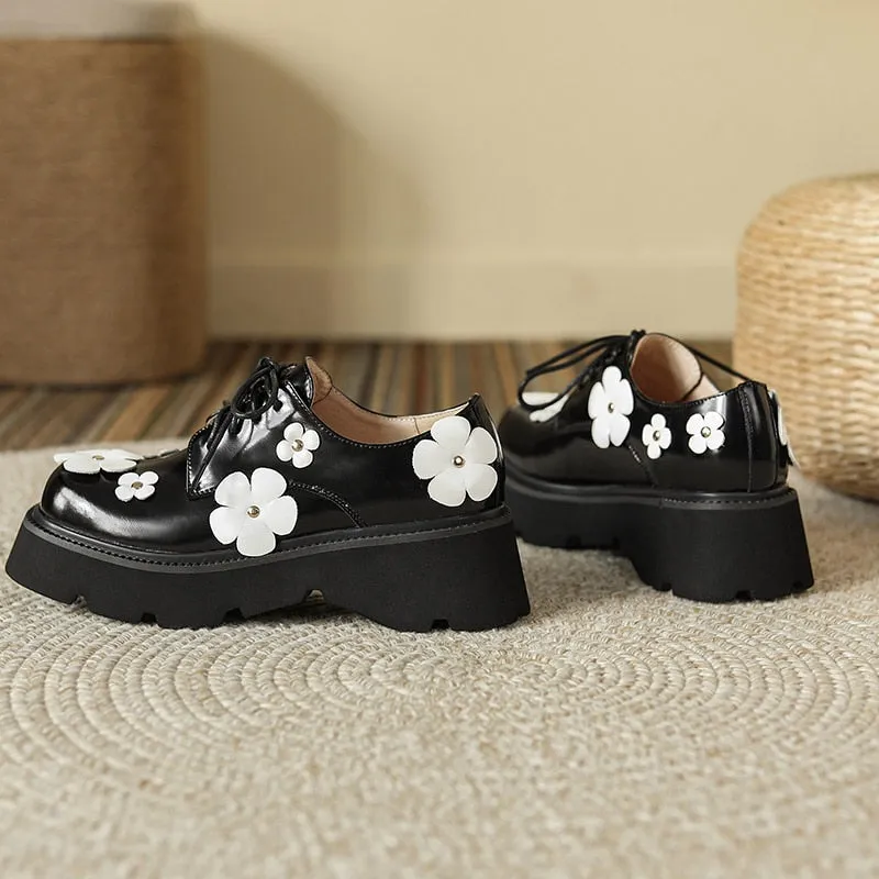 Thick Bottom Black Leather Loafers with White Leather Daisy Appliqués